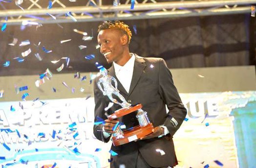Kenneth Muguna displaying his 2016 Most Valuable Player (MVP) gong. 